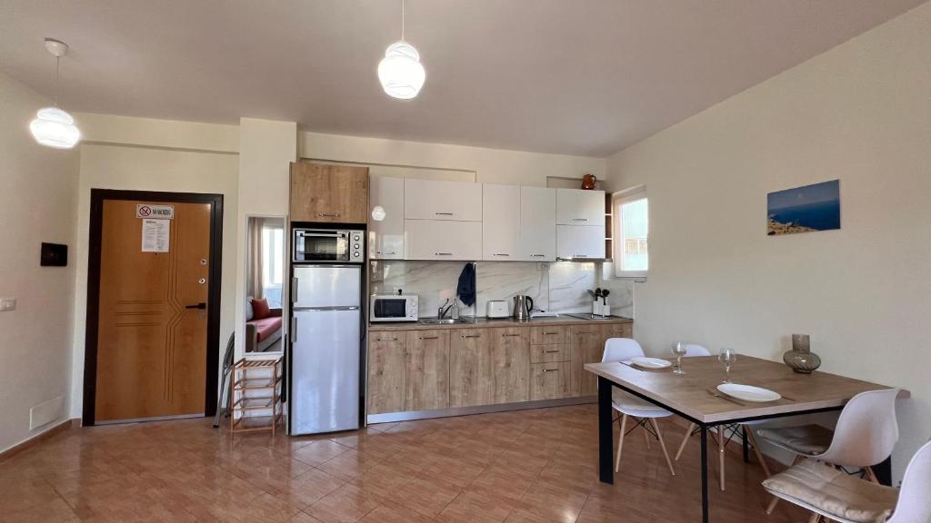 Kuchyň nebo kuchyňský kout v ubytování Marina Apartment