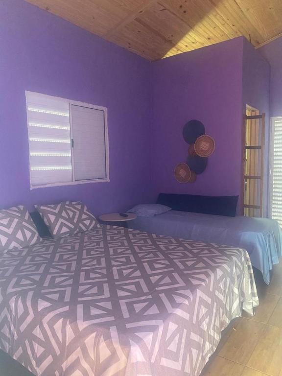Postel nebo postele na pokoji v ubytování CHALÉS MARICOTA