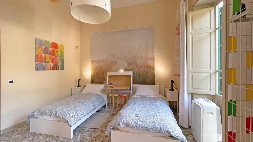 Postel nebo postele na pokoji v ubytování Three Rooms