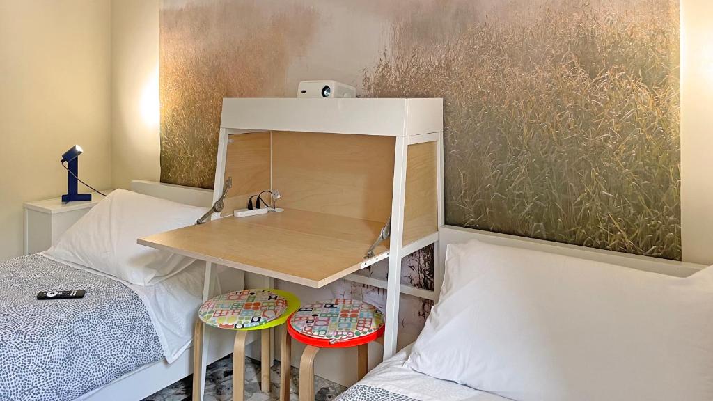 Postel nebo postele na pokoji v ubytování Three Rooms