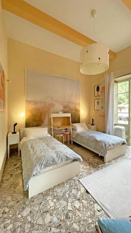 Postel nebo postele na pokoji v ubytování Three Rooms