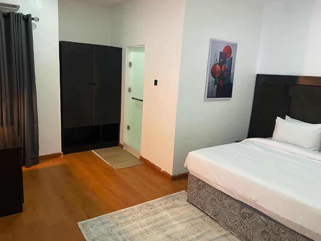 Voodi või voodid majutusasutuse PEPE Suites toas