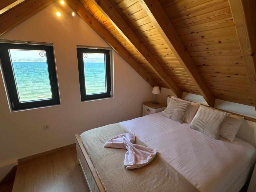 Ένα ή περισσότερα κρεβάτια σε δωμάτιο στο Villa Thea