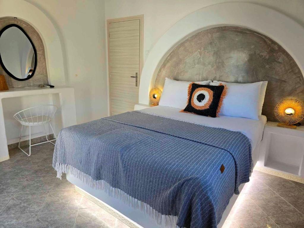 Postel nebo postele na pokoji v ubytování Papafotis Apartments & Suites