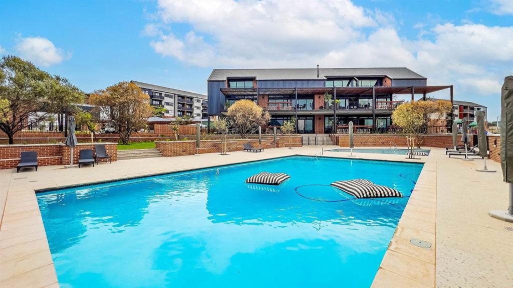 Πισίνα στο ή κοντά στο Bytes Apartment - Midrand