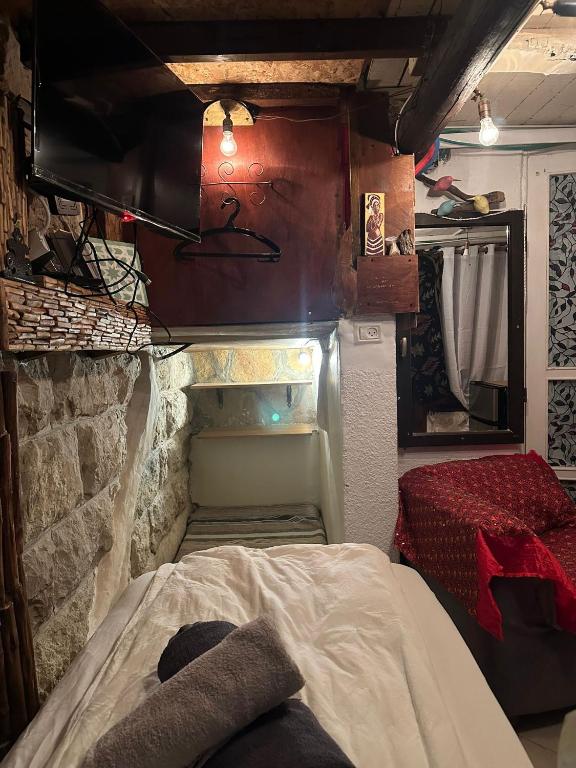 Postel nebo postele na pokoji v ubytování Sweet ‘En Kerem View