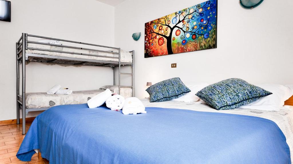 Postel nebo postele na pokoji v ubytování Albergo Dalla Mena