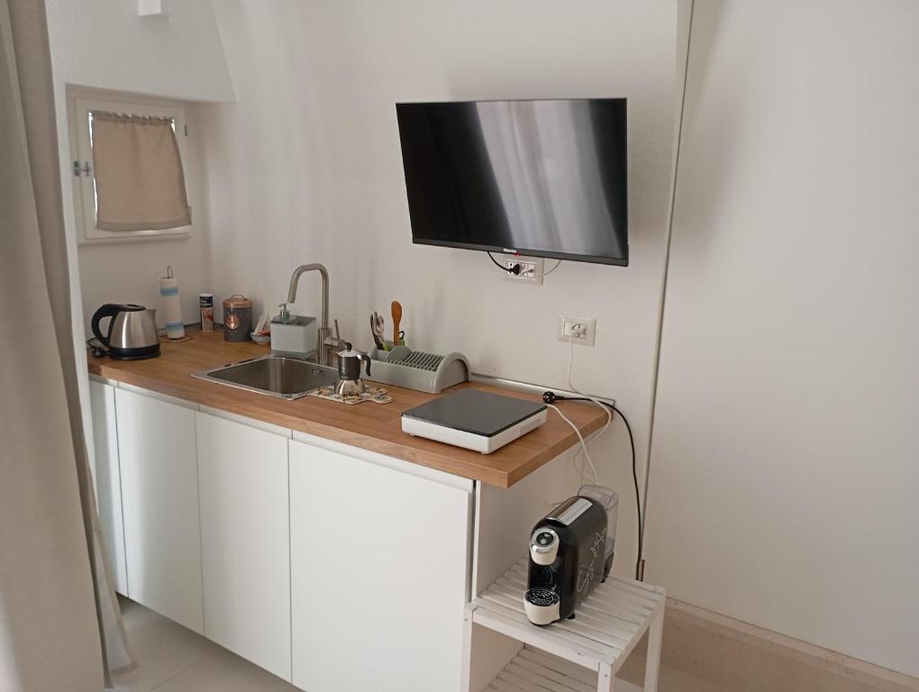 Kuchyň nebo kuchyňský kout v ubytování B&b La Fontana