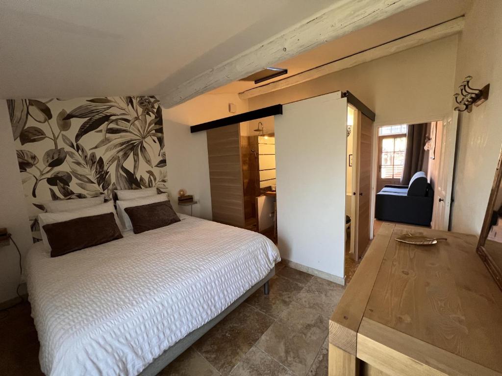 Cama o camas de una habitación en Mas d'Auseu