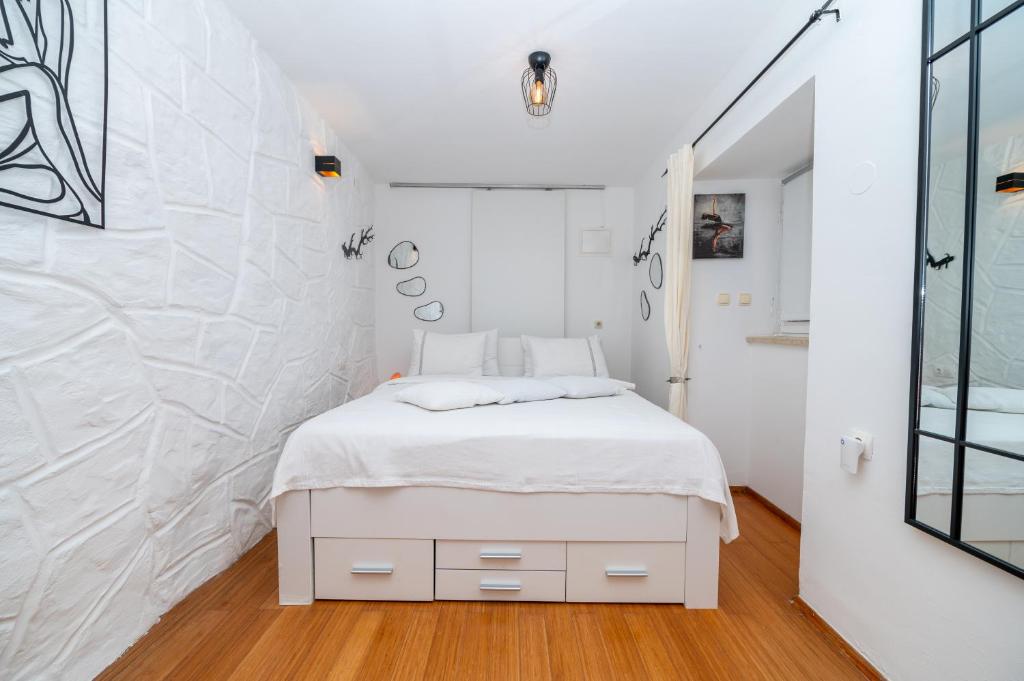 Posteľ alebo postele v izbe v ubytovaní Apartments Vitoria