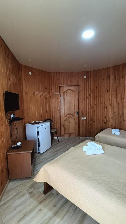 Postel nebo postele na pokoji v ubytování Villa Ureki