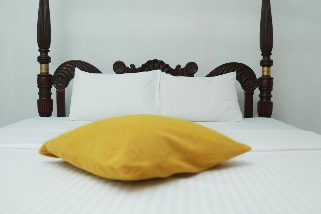 Postel nebo postele na pokoji v ubytování Rosanuka Beach Villa
