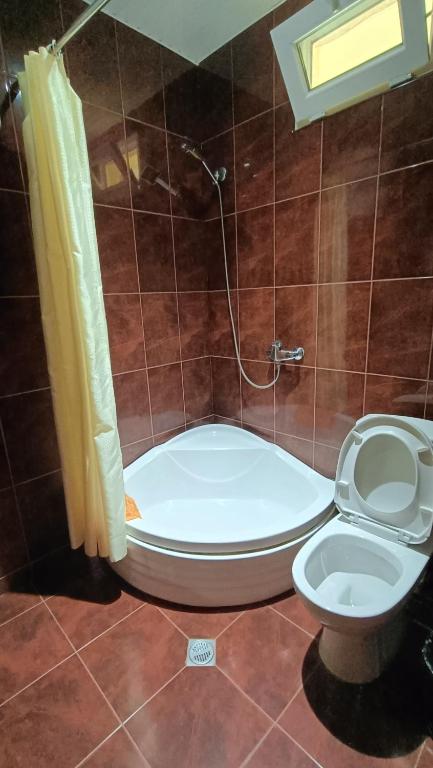 Koupelna v ubytování Villa Ureki