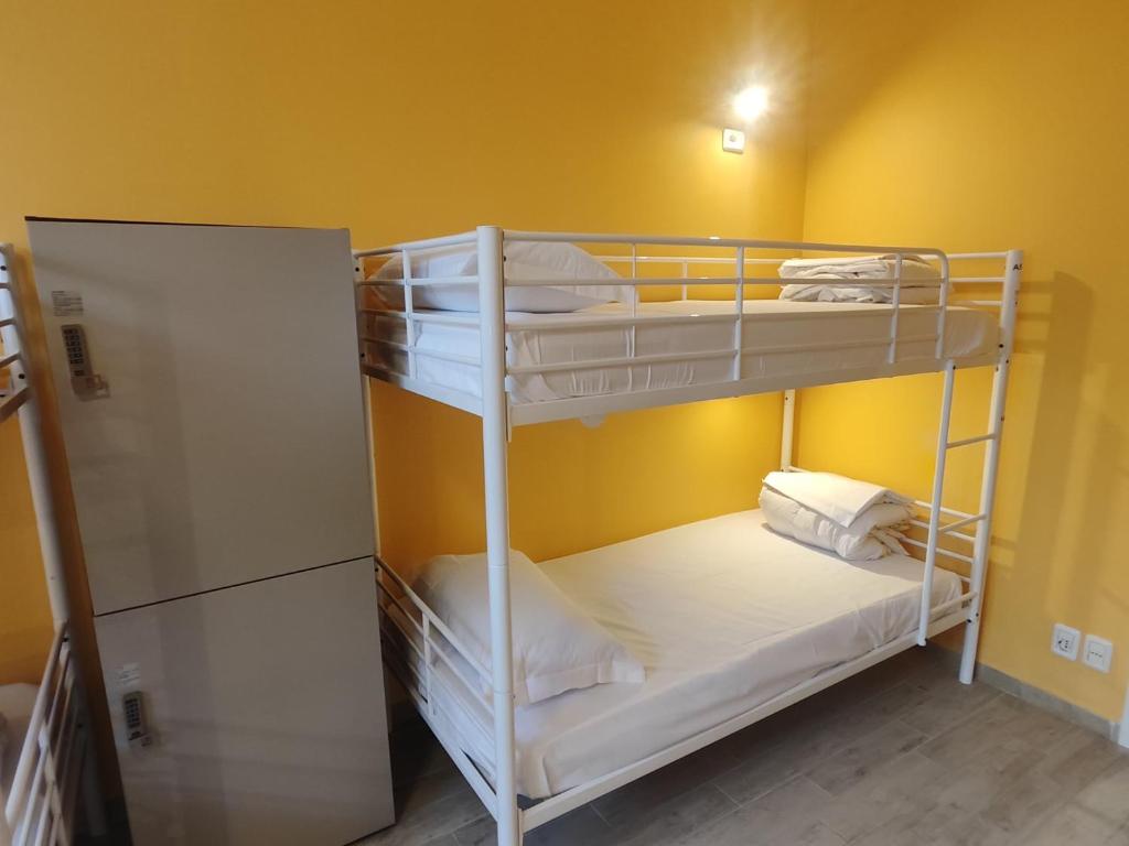 Postel nebo postele na pokoji v ubytování Cinhouse