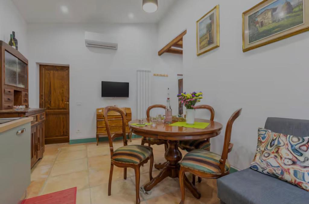 TV a/nebo společenská místnost v ubytování Casa Gavì