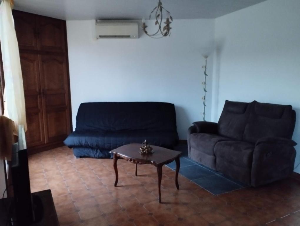 Posezení v ubytování Comme chez Mamies