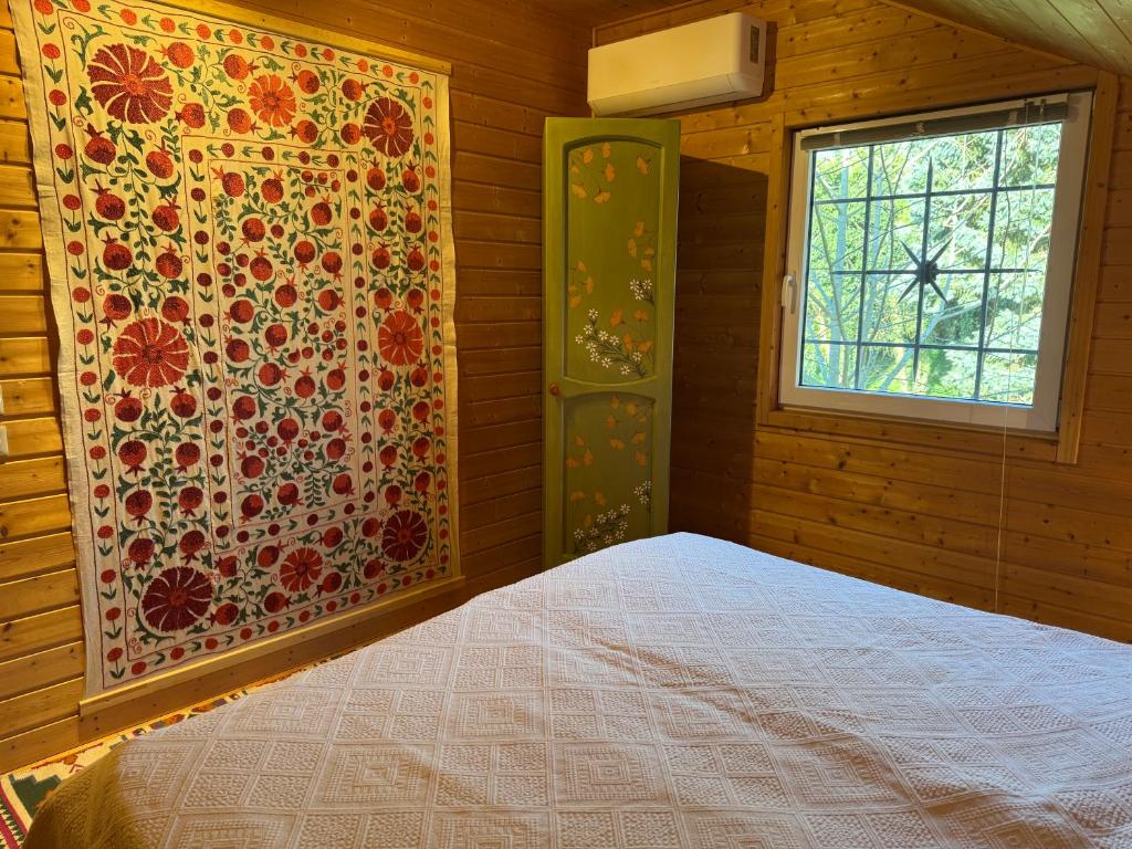 Postel nebo postele na pokoji v ubytování Ginkgo House