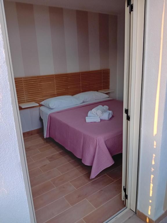 Postel nebo postele na pokoji v ubytování B&B EmaNik