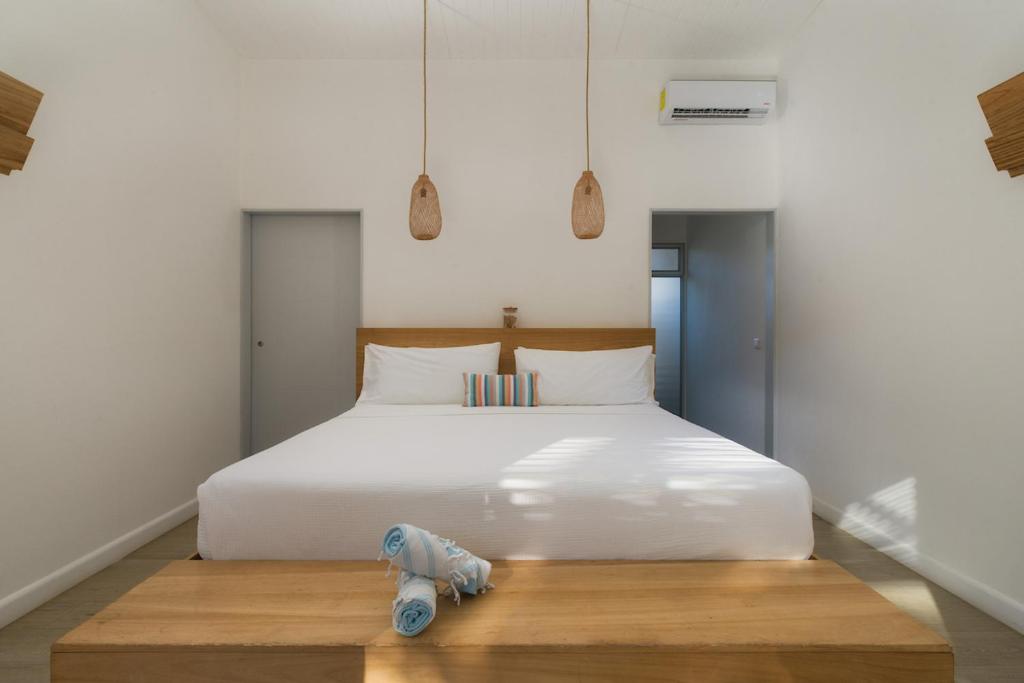 Postel nebo postele na pokoji v ubytování BOHO Tamarindo