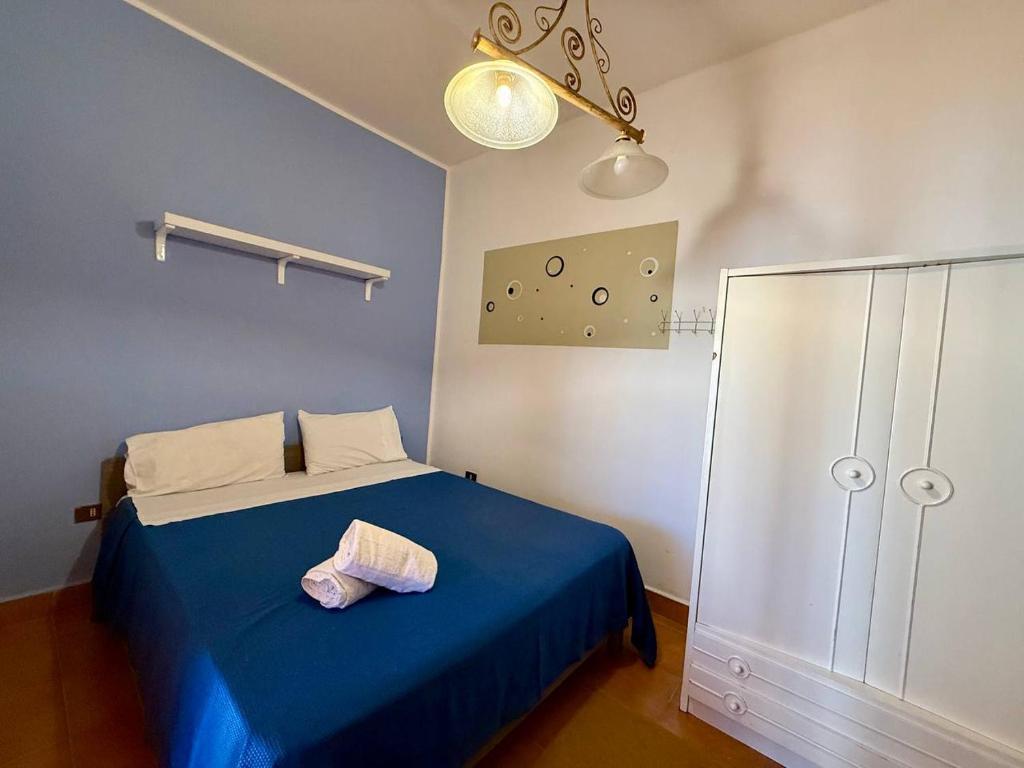 Postel nebo postele na pokoji v ubytování Mazzini House