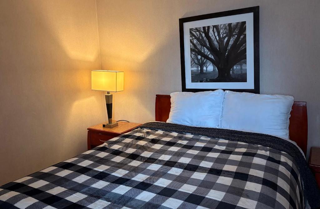 Postel nebo postele na pokoji v ubytování Art Infiniti Hotel