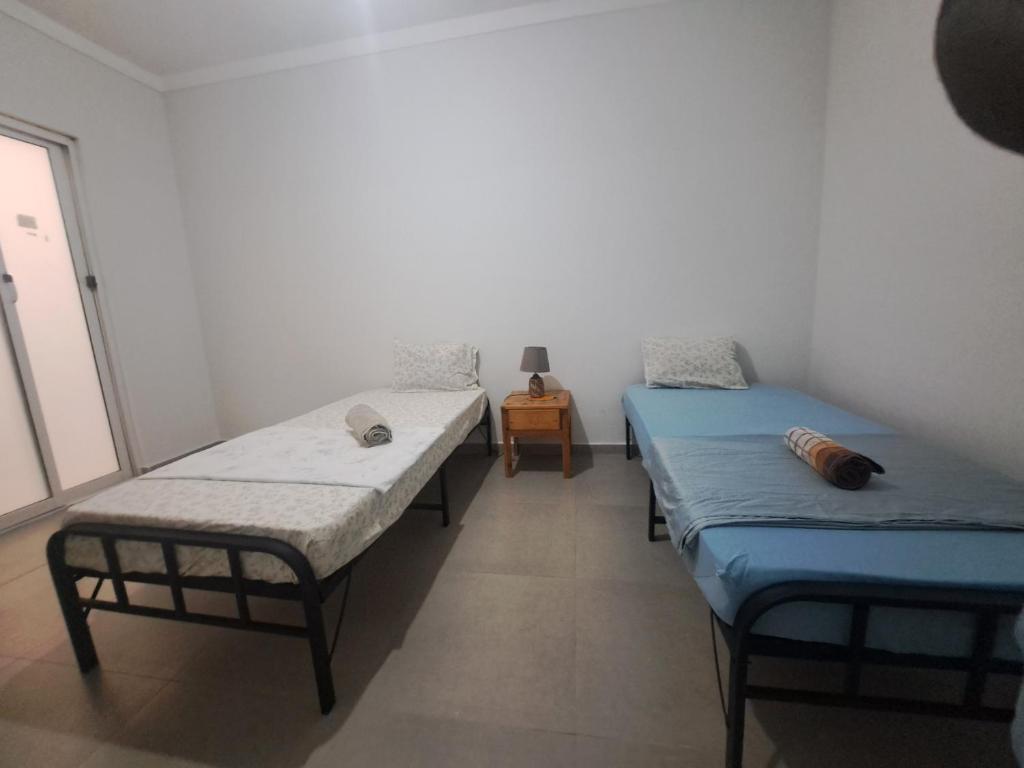 Postel nebo postele na pokoji v ubytování Barros Homestay