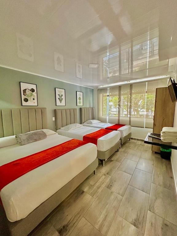 Postel nebo postele na pokoji v ubytování Hotel Nakama