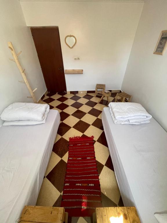 Postel nebo postele na pokoji v ubytování Epicswellhouse