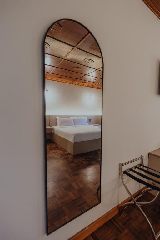 Postel nebo postele na pokoji v ubytování Hotel Boutique Rebequet