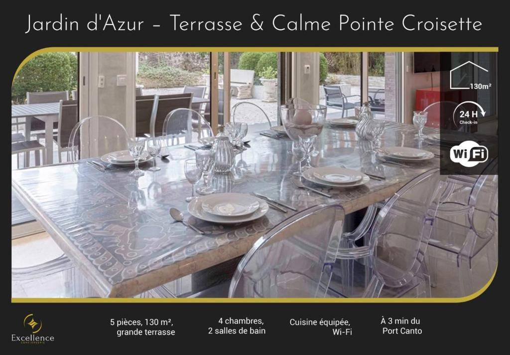 une table avec des verres et des assiettes au-dessus dans l'établissement Jardin d'Azur – Terrace, Calm & Croisette, à Cannes