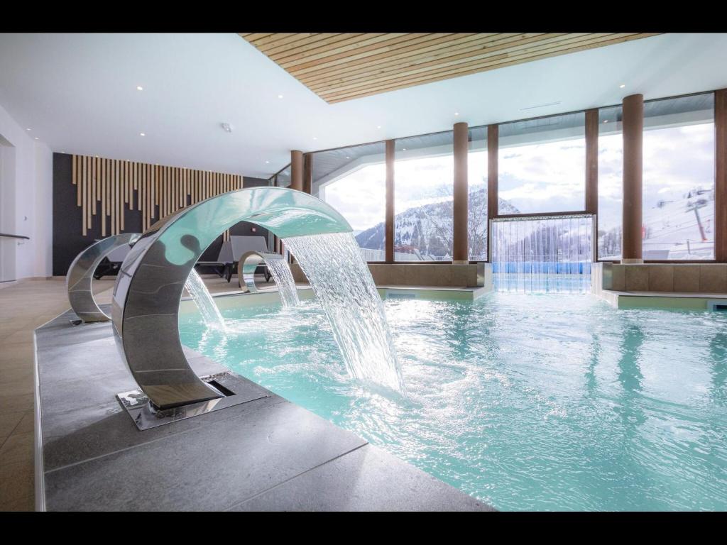 Photo de la galerie de l'établissement Apartment in Le Corbier with Pool & Spa, à Villarembert