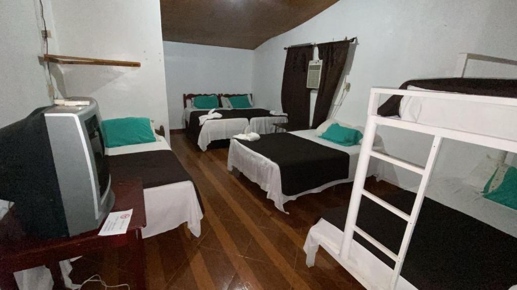 Postel nebo postele na pokoji v ubytování Hotel Marjenny