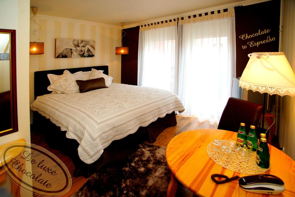 Postel nebo postele na pokoji v ubytování Hotel Ottaviano