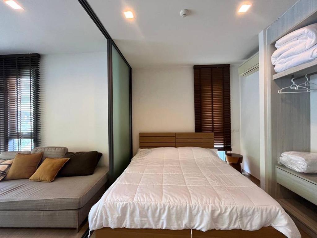 Postel nebo postele na pokoji v ubytování 23 Degree Khaoyai condo