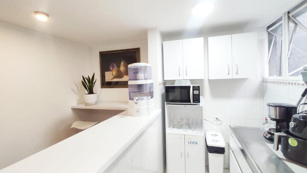 Kuchyň nebo kuchyňský kout v ubytování HABITACION 8 AMPLIA baño y balcón privado UNICENTRO