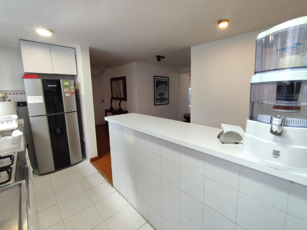 Kuchyň nebo kuchyňský kout v ubytování HABITACION 8 AMPLIA baño y balcón privado UNICENTRO