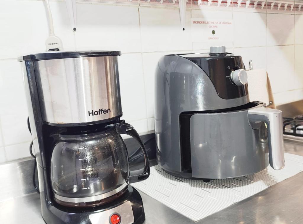 Kuchyň nebo kuchyňský kout v ubytování HABITACION 8 AMPLIA baño y balcón privado UNICENTRO