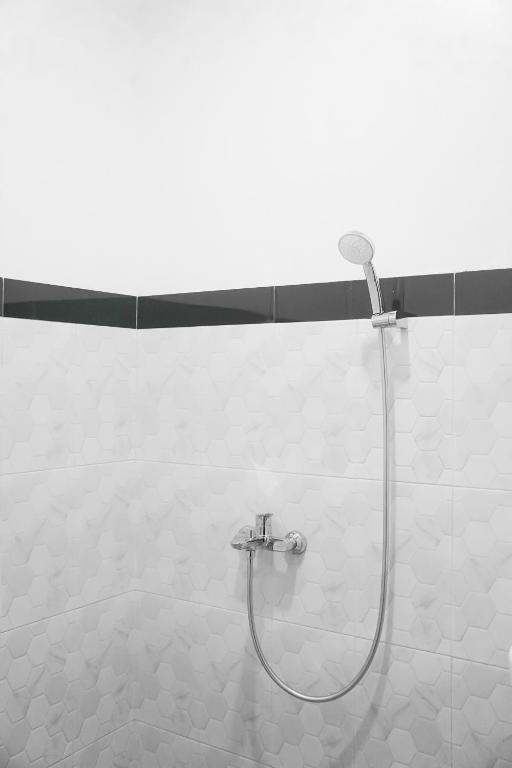 RR -2 Syariah Hotel SLG - Deluxe Tweepersoonskamer Met 2 Aparte Bedden