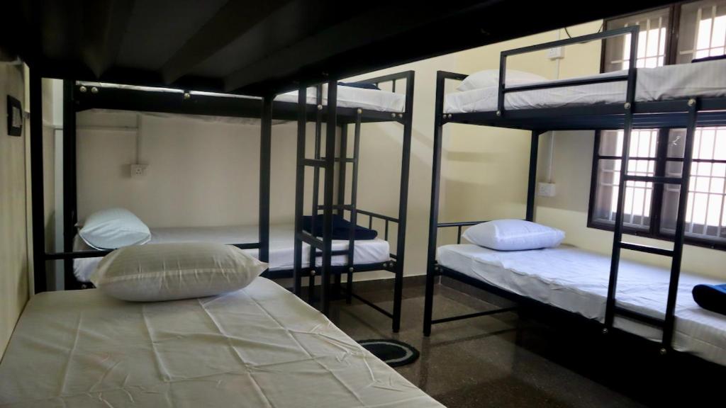 Voodi või voodid majutusasutuse Ulala Hostels - Feels like HOME toas