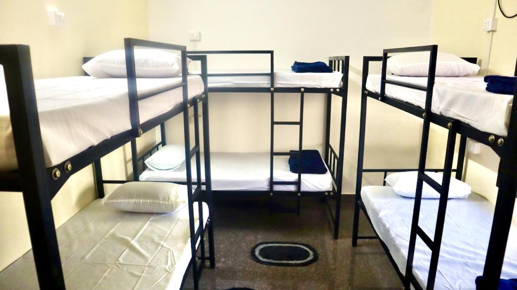 Voodi või voodid majutusasutuse Ulala Hostels - Feels like HOME toas