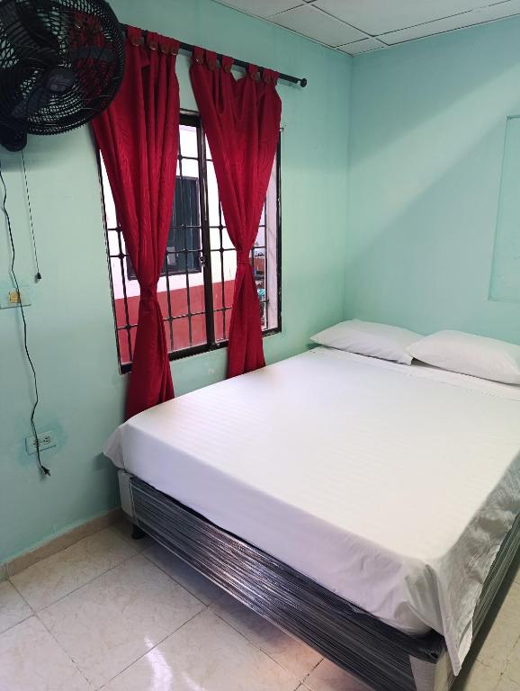 Letto o letti in una camera di Hostal Amanecer del Valle