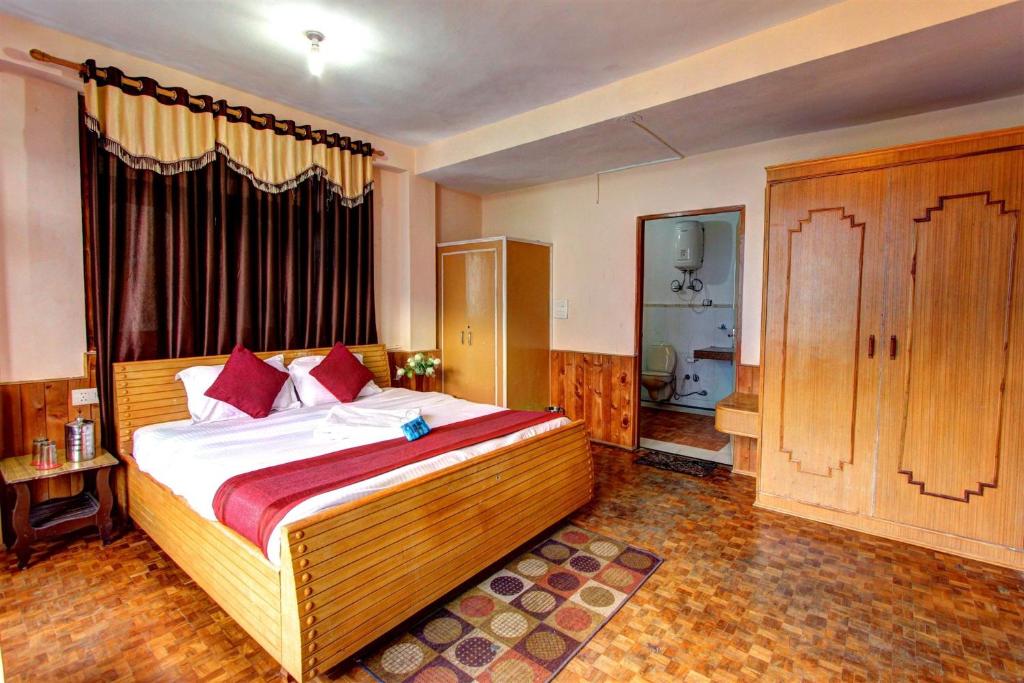 Voodi või voodid majutusasutuse The Ambience Resort, Nainital - A Hidden Gem Away From City Hustle toas