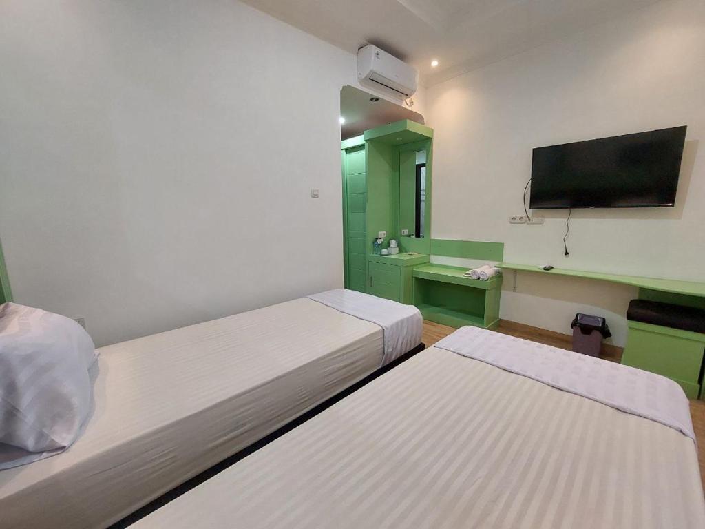Ully Hotel Solok - Superior Doppelzimmer