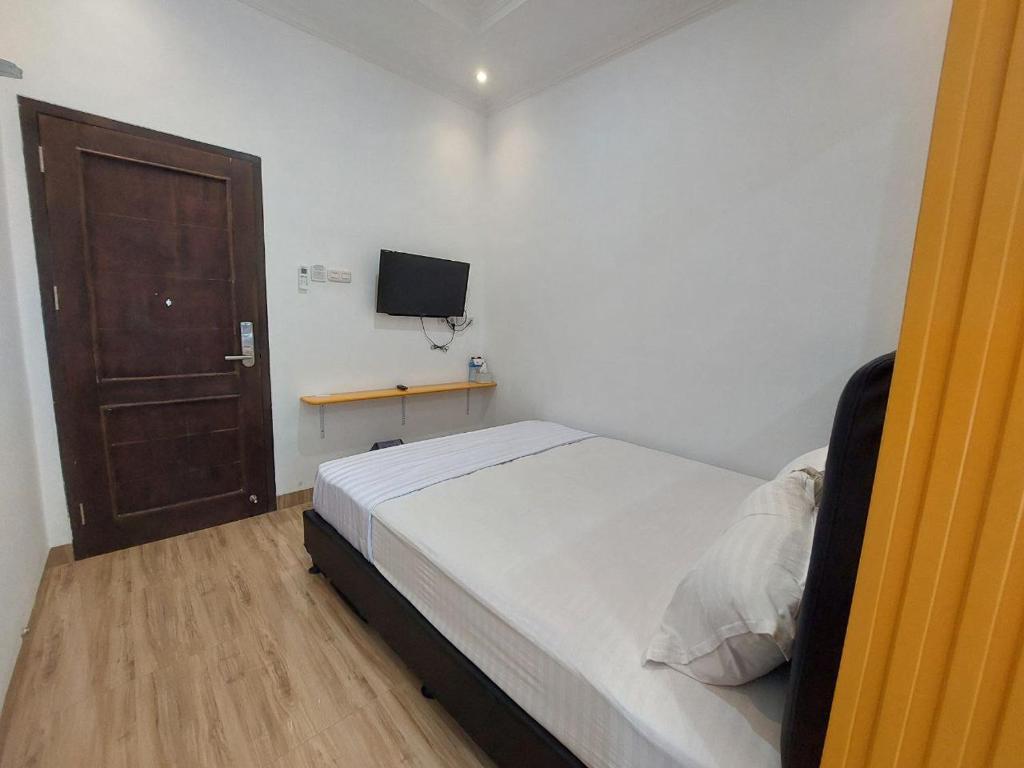 Ully Hotel Solok - Standardzimmer Mit Queensize-Bett