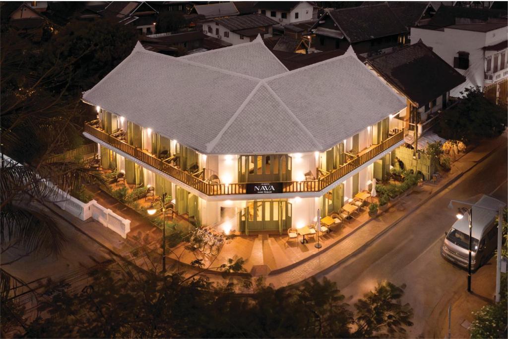 an overhead view of a building at night with lights at Nava Luang Prabang Hotel in Luang Prabang