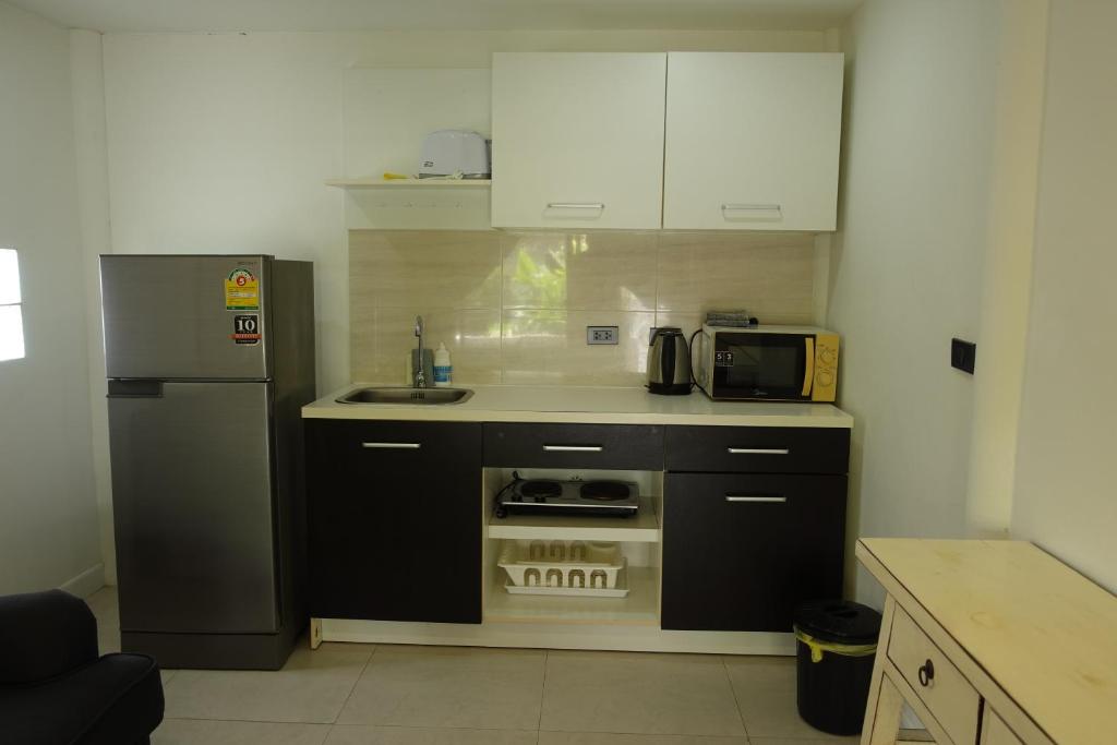 Kuchyň nebo kuchyňský kout v ubytování Aussieland Bungalows