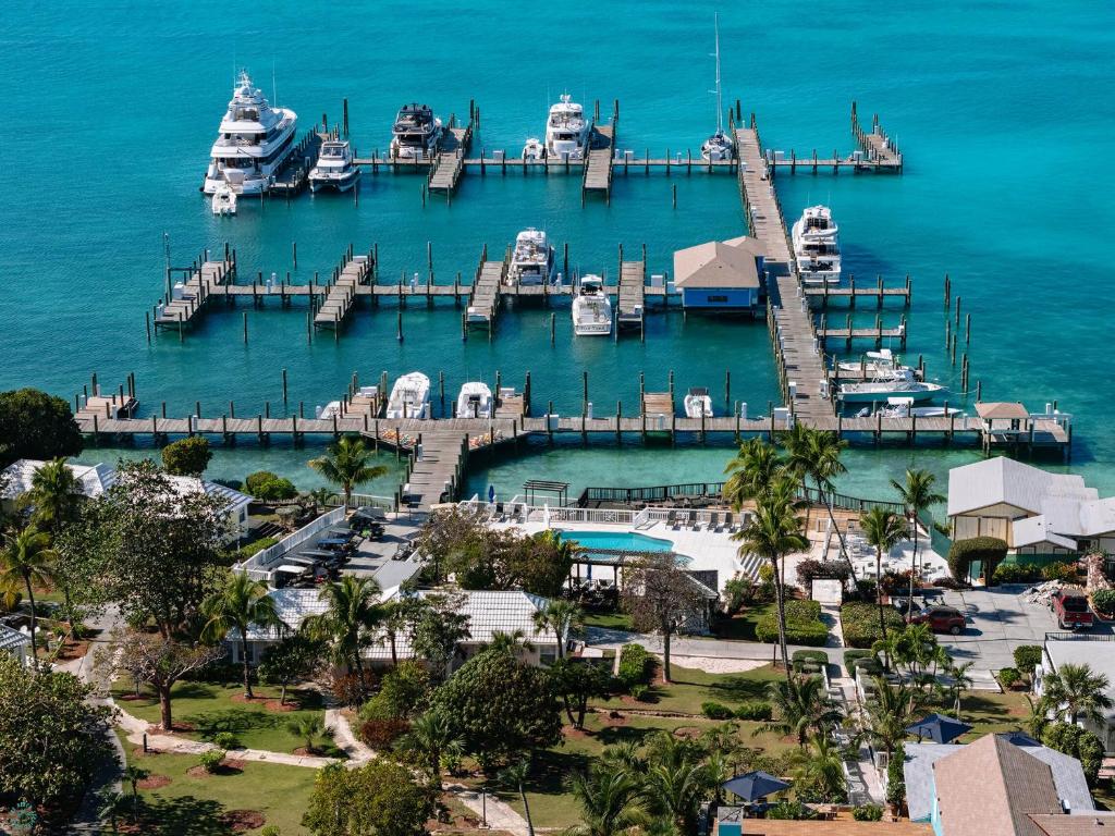an aerial view of a marina with boats in the water at Romora Bay Resort & Marina in Harbour Island