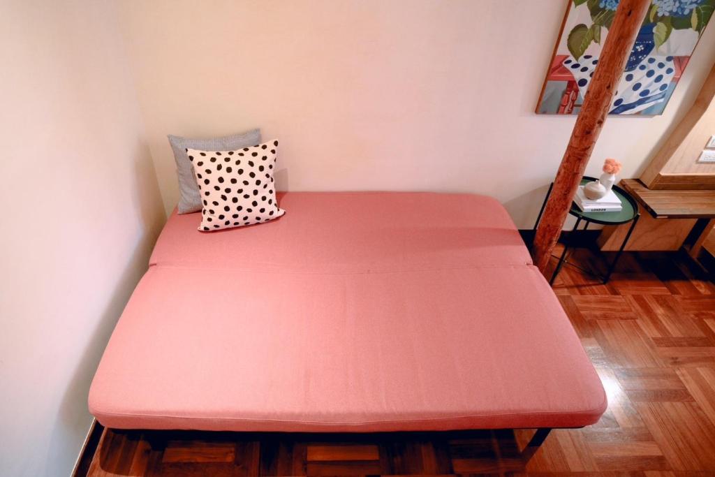 Postel nebo postele na pokoji v ubytování Yun Tien Feng Chuan B&B