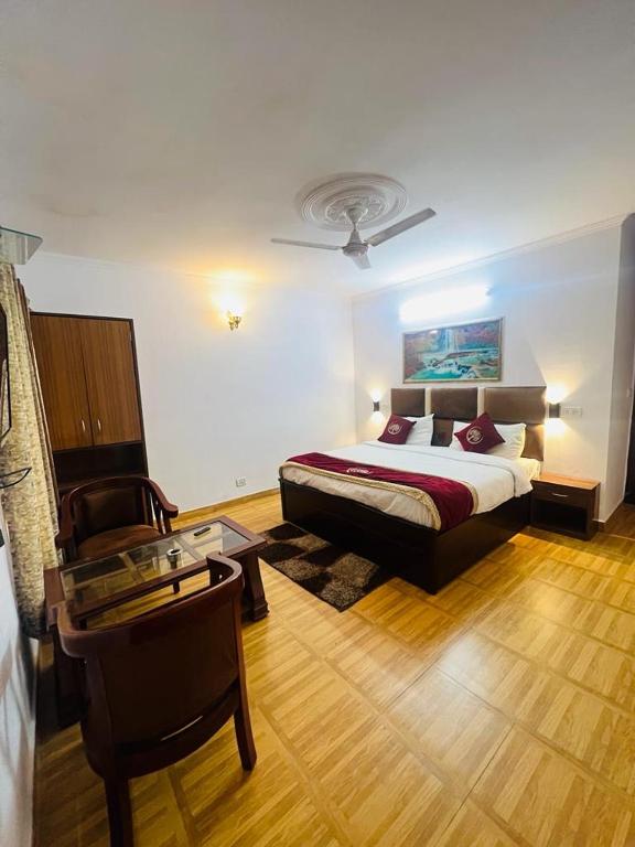 Voodi või voodid majutusasutuse The Ambience Resort, Nainital - A Hidden Gem Away From City Hustle toas