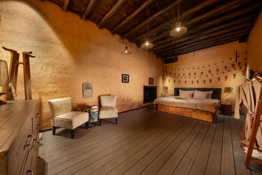 Postel nebo postele na pokoji v ubytování P'apiu Resort